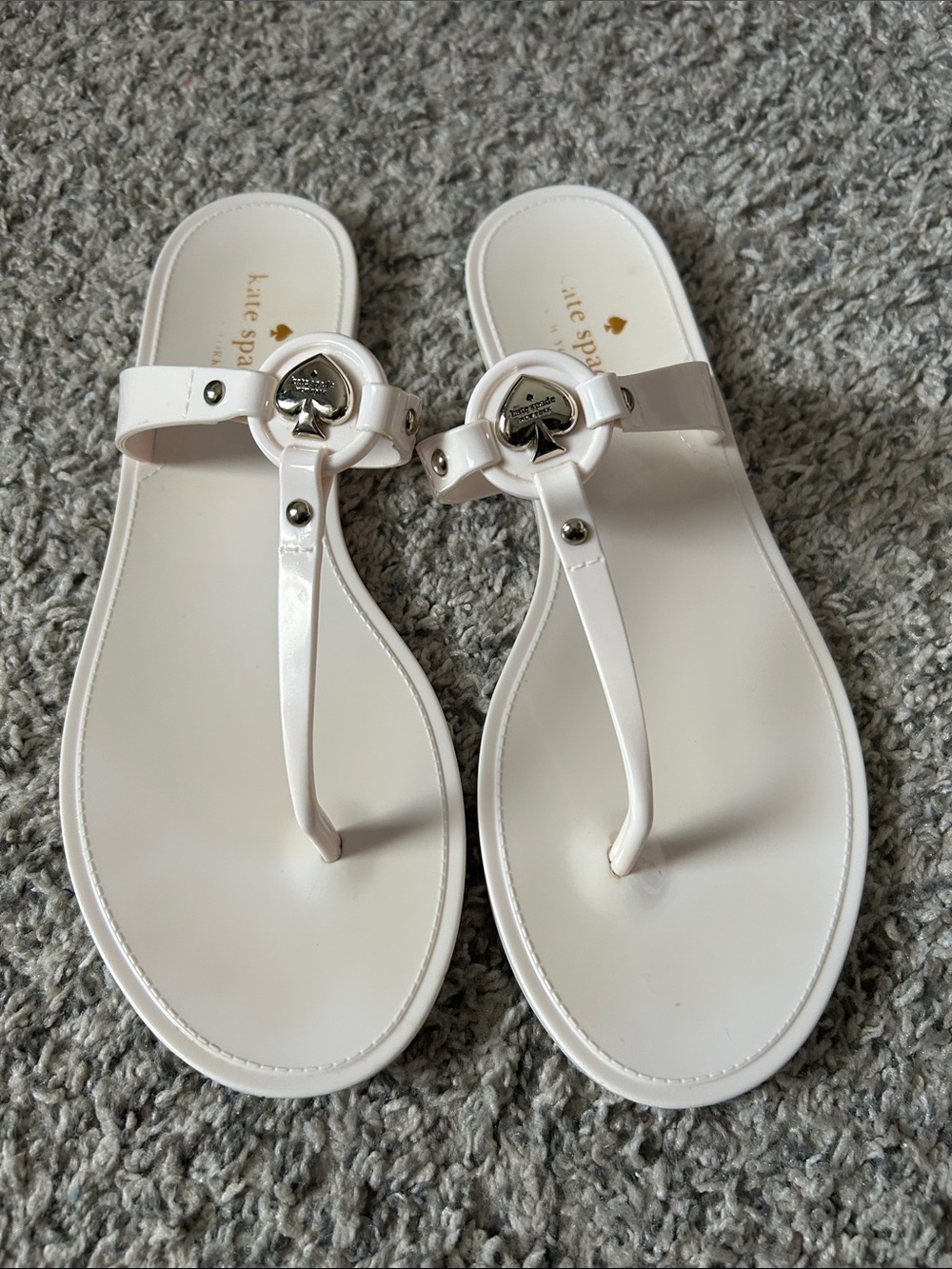 kate spade White Patent Leather T-Strap Sandals with Spade Emblem